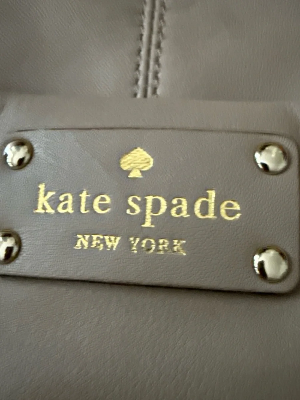 kate spade taupe leather shoulder bag with front pocket